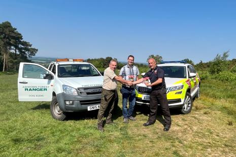 Photo of East Sussex Fire and Rescue Service providing wildfire safety leaflets to Ashdown Forest Rangers
