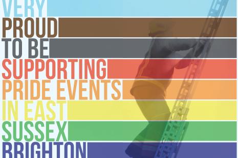 We are very proud to be supporting pride events in East Sussex Brighton & Hove, coloured graphic with Firefighter in the background