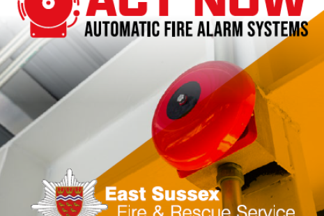 Fire alarm system and the words Act Now