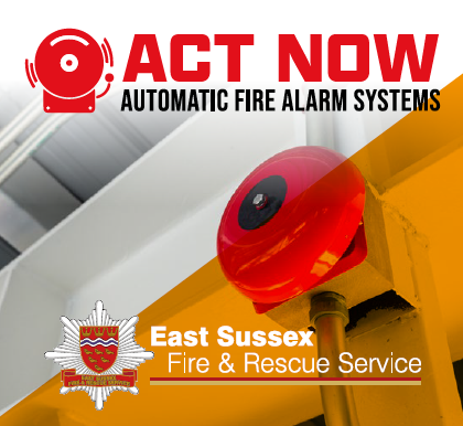 Fire alarm system and the words Act Now