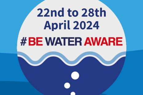 Blue logo with white circle and #BE WATER AWARE in Blue and red writing in the centre with the date above 22nd to 28th April 2024 and blue wavy lines underneath to look like water at the bottom of the circle. East Sussex FRS and NFCC logos in the bottom left and right hand corners.