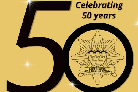 Gold background with black writing 'Celebrating 50 years', large number 50 in black with the ESFRS crest inside the zero. www.esfrs.org at the bottom centre. Twinkling stars across picture.